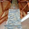 A central fireplace with a timber frame